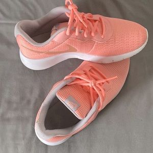 Nike athletic shoes, worn a few time. Basically new shoes! They are size 7Y.
